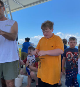 Boy with Crab on Sea Screamer